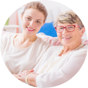 Happy elder and caregiver