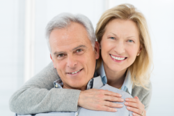 Caregiver and elder smiling